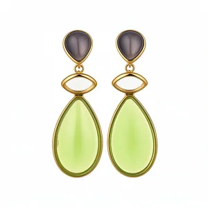 Elegant vintage style resin waterdrop drop earrings with gold finish on white background