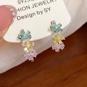 Elegant S925 silver stud earrings with colorful zircon flower cluster design charms.