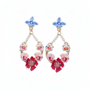 Elegant vintage floral drop earrings with pearls, crystals, and colorful enamel finish