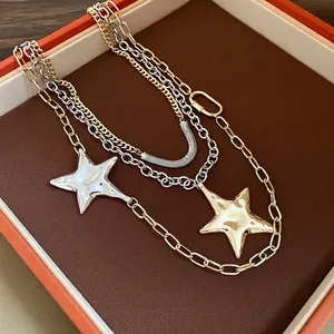 Collana multistrato retrò in metallo con ciondoli a stella dorati e argentati