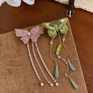 Barrettes papillon brodées de style chinois avec de longues franges de perles élégantes