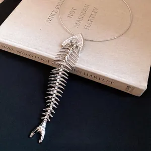 Oversized silver fishbone pendant choker necklace for women, stylish statement jewelry.