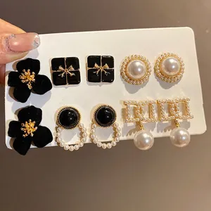 French retro style 6-pair earring set with black flowers and pearls on white card