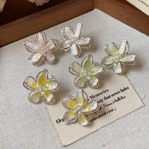 Elegant silver needle enamel flower stud earrings in various delicate pastel colors