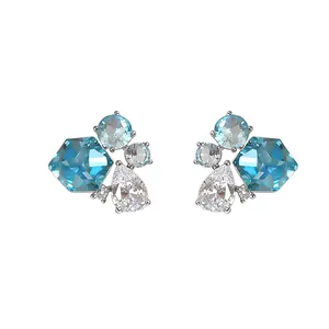 Elegant vintage silver stud earrings with blue and clear teardrop zircon stones set