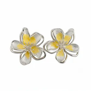 Elegant silver flower stud earrings featuring vibrant yellow enamel center for women