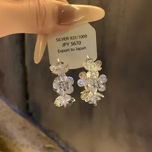 Exquisite three-dimensional cubic zirconia flower stud earrings made of sterling silver