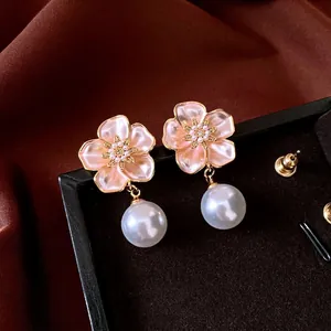 Vintage French flower stud earrings with pink enamel petals and white hanging pearls