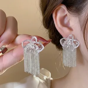 Elegant resin flower tassel earrings with sparkling zircon accents and silver needles