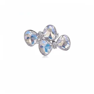 Exquisite silver-colored bow-shaped open ring with sparkling crystals and pavé stones