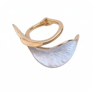 Elegant vintage gold-plated open bangle with unique pleated white flower petal detail