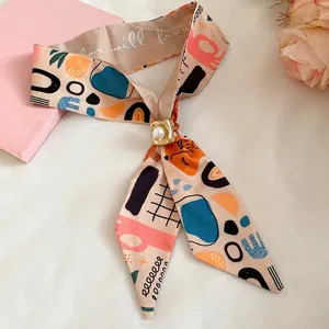 Abstract art print skinny neck scarf necklace with elegant gold pearl slide buckle accessory