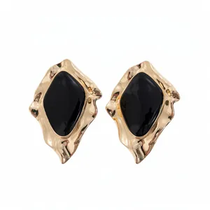 Elegante vintage unregelmäßige geometrische Ohrstecker mit schwarzer Emaille und Gold