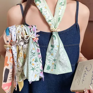 Close-up of stylish floral printed fabric scarf necklaces for summer neck decoration