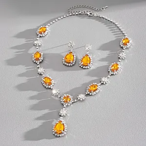 Vintage amber crystal necklace and earring set with silver-tone detailed stones