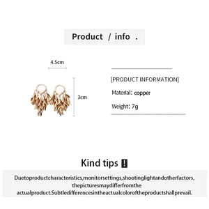 Product specifications for gold leaf tassel earrings with dimensions and copper material info