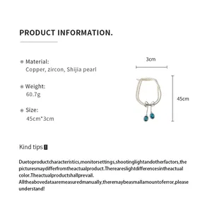 Détails du collier de perles double épaisseur avec nœud en zircon et longueur de 45 cm