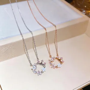 Zircon mother-of-pearl flower butterfly pendant necklace in silver and rose gold