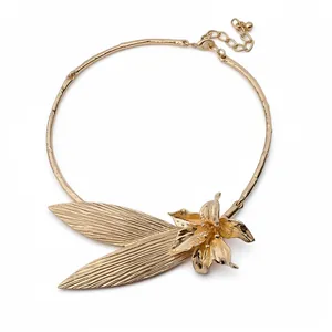 Elegant gold-tone metal choker necklace featuring a vintage flower and textured leaf pendant.