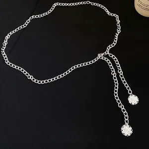 Elegant silver chain waist belt with ornate circular pendants for dresses and pants