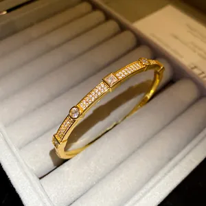 Macro detail view of 18K gold plated bracelet featuring exquisite zircon stones inlay