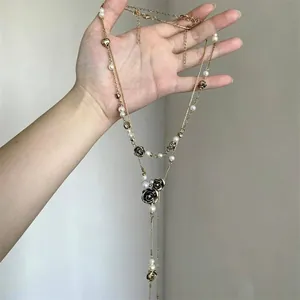 Vintage rose and pearl double-layer long necklace with elegant gold chain tassels