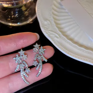 Shimmering meteor star clip-on earrings with high-quality cubic zirconia stones detail.