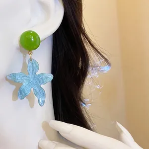 Summer beach style blue resin starfish flower drop earrings with green studs