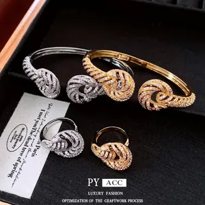 Exquisite 18K gold plated twisted zircon open bangle and matching ring set for women