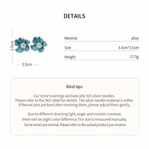 Vue détaillée des boucles d'oreilles fleurs avec taille, poids et matériaux