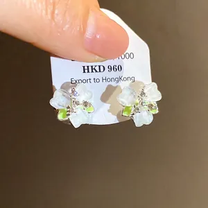 Exquisite flower-shaped earrings with translucent petals and lime green accents
