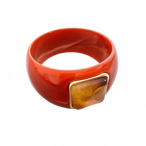 Elegant red acrylic wide bangle bracelet featuring an amber square resin gemstone
