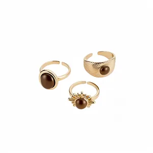 Elegante set di 3 anelli regolabili in oro e resina con design vintage a motivo sole