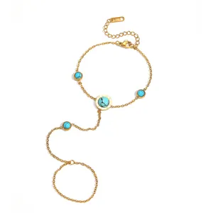 Bracelet bague élégant en acier titane avec perles turquoise et chaîne de main délicate