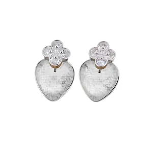 Elegant ice blue heart-shaped resin drop earrings featuring sparkling zircon clover studs.