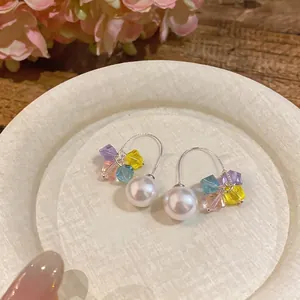 Elegant pearl drop curved earrings featuring a colorful crystal flower design for summer