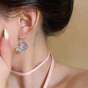 Detailed close-up view showing elegant multi-colored crystal cube drop earrings on model