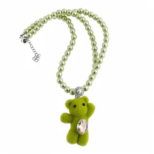 Elegant necklace featuring a cute green plush bear pendant and light green pearls for women