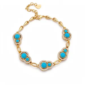 Elegant gold-plated bracelet featuring blue turquoise and hollow gourd-shaped zircon pavé