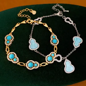 Detailed view of exquisite blue zircon gourd bracelets in gold and silver finish