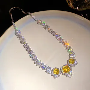 Exquisite vintage style necklace featuring square yellow zircons and white crystals