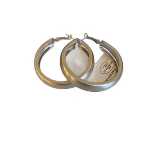 Minimalist brushed silver round hoop earrings for women with elegant light luxury design