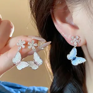 Elegant zircon butterfly and flower stud earrings for a sophisticated look