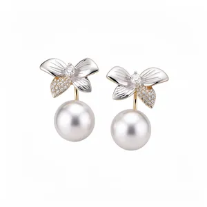 Elegant flower-shaped pearl stud earrings with sparkling crystals in silver and gold.