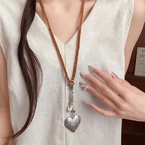 Handmade minimalist shell heart pendant long necklace with brown twisted rope cord for women