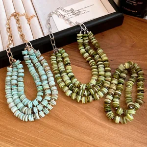 Elegant multi-layer shell beaded necklace and bracelet set in aqua and olive green tones