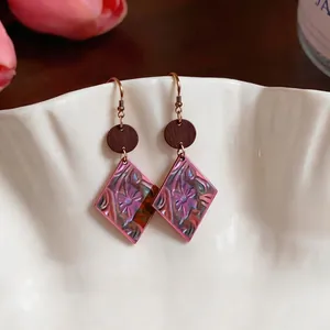 Vintage bohemian pink rhombic earrings with floral pattern and wood accents