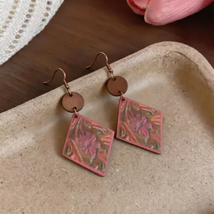 Vintage Bohemian pink rhombus earrings with intricate floral pattern and wooden accent detail