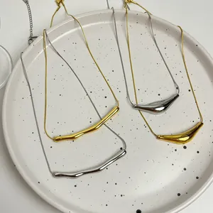 Minimalist stainless steel smile pendant necklaces in gold and silver metallic finish