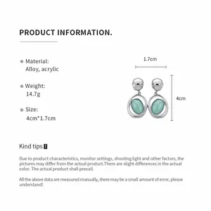 Detailed product specifications for vintage acrylic oval drop earrings in silver tone